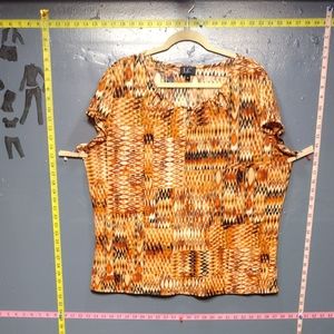 Cute orange and black top